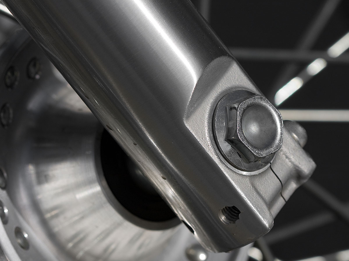 Closeup of motorcycle wheel and fork